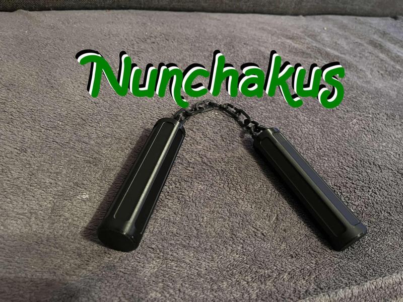 Nunchakus connected by a chain