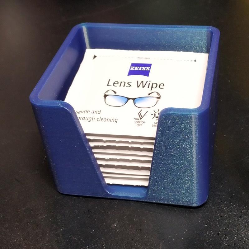 Lens wipe dispenser