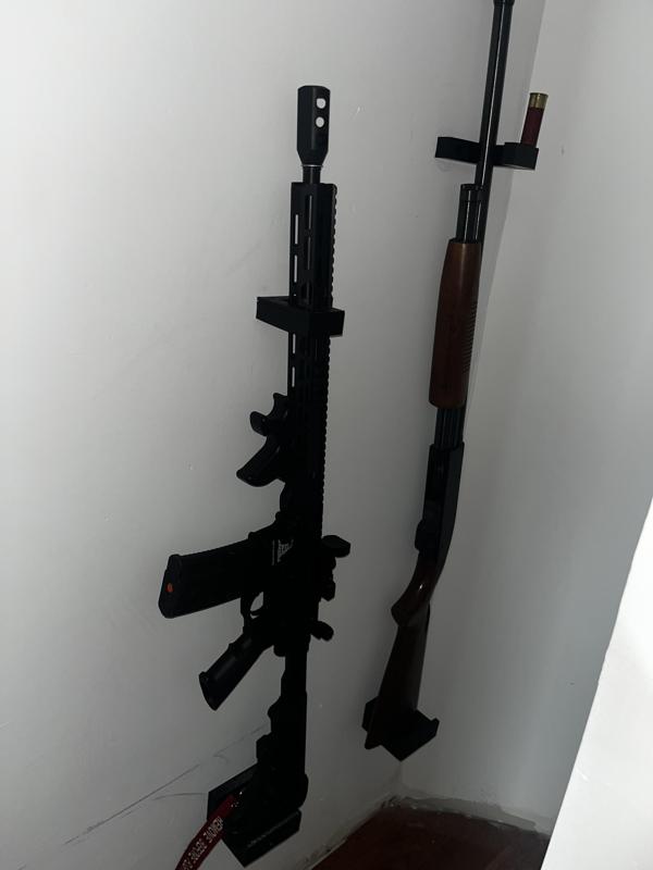 Vertical Universal Gun Rack- 2 parts, 3 Screws. 100% effective.