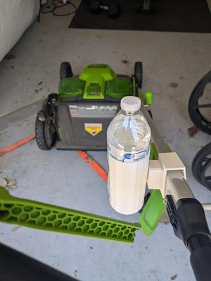 Lawn mower water bottle holder attachment for all green works self propelled lawn mowers
