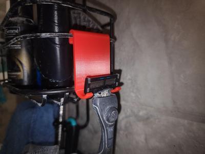 Razor hanger for shower caddy