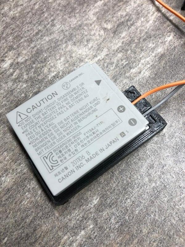 NB-4L Li-Ion holder for charging from 3rd party charger