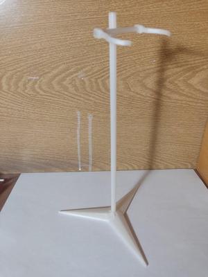 Adjustable doll stand