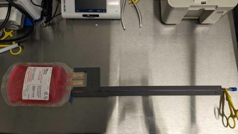 Terumo transfer bag tubing / IV extension set tubing holder 