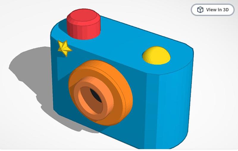 Toddlers playing with lens