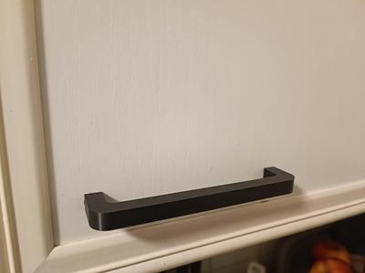 Simple kitchen cupboard door handle
