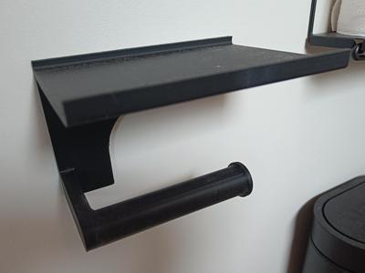 Toilet paper holder with tray
