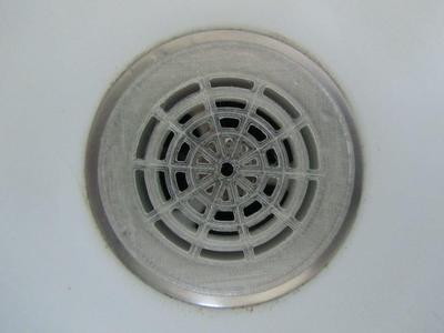 Hair trap for shower drain