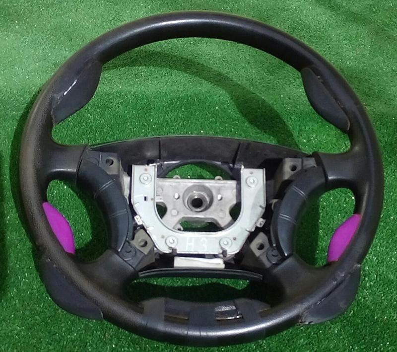 Anatomic steering wheel pad cover