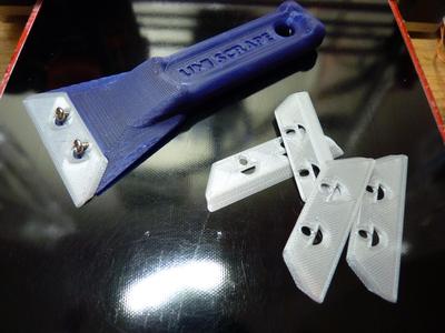 Universal Scraper with replaceable "blade"