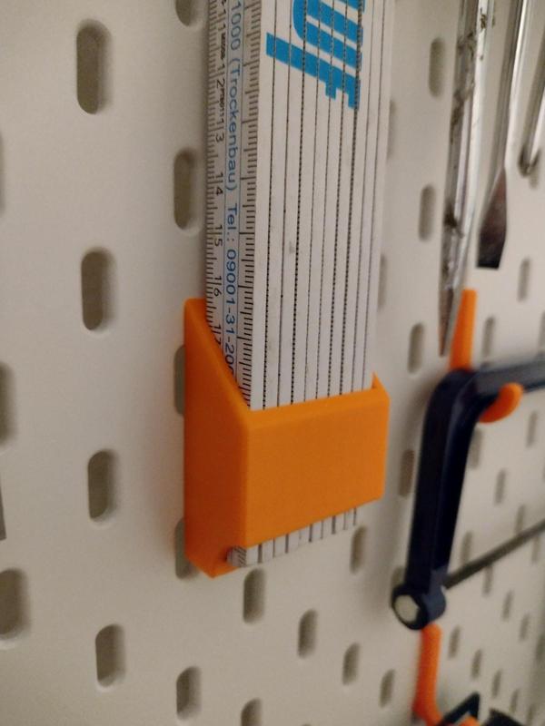 Skadis folding rule holder