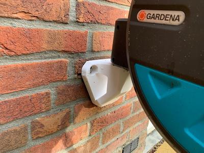 Gardena garden hose holder