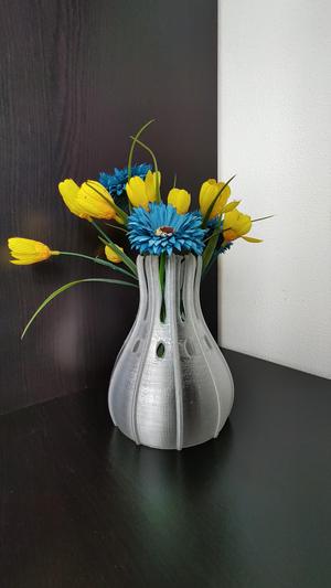 Vase with holes