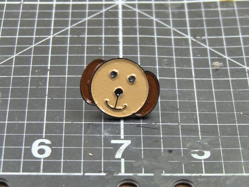 Dog head enamel pin