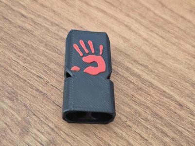 Whistle with a red hand