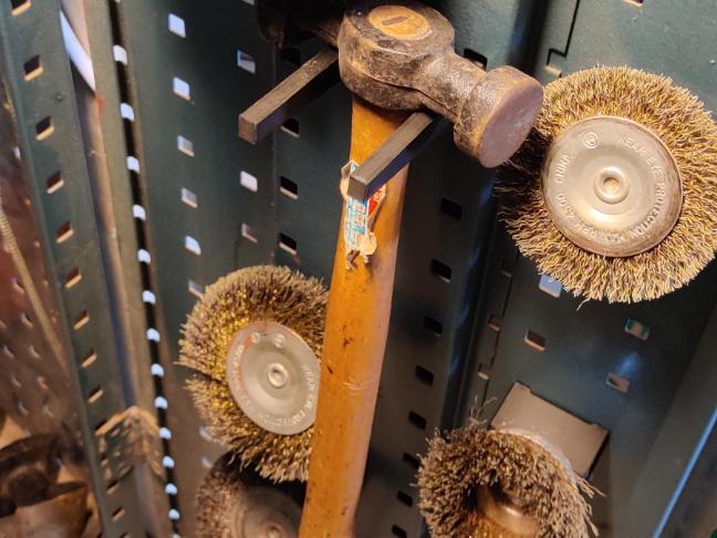 Several Tool holders for cabinet with square holes