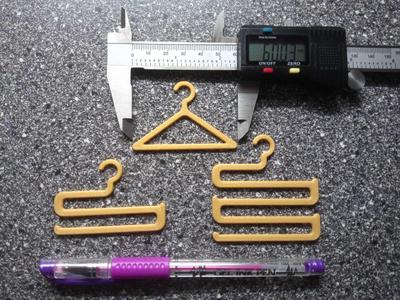 THREE HANGERS FOR DOLL CLOTHES - BARBIE