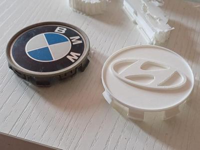 BMW e49 wheel cover with Hyundai logo