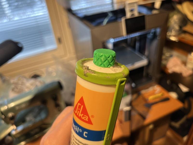 Silicone (and other) caulk cartridge cork/cap.