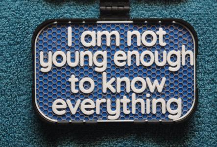 Not young enough to know everything sign