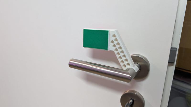 Overeengineered door sign