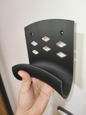 Vacuum hose holder