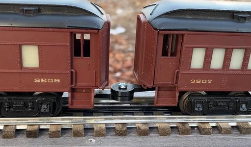 Pin coupler for Lionel train