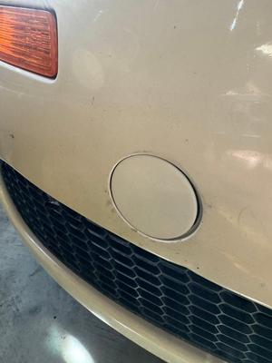 VW New Beetle tow hook hole cover