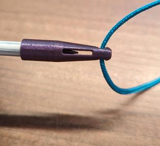 Pencil cap with lanyard eyelet