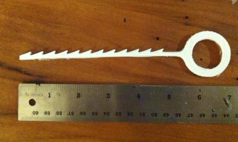 Device for getting @#$! hair out of the @#$! drain again