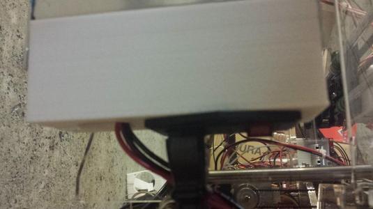 Power supply cover with hole sized for male connector / power switch combo