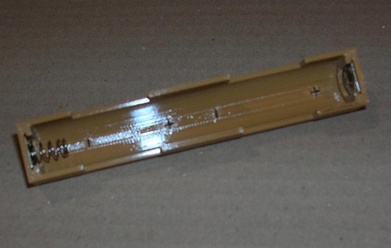 Battery box for two 1.5V AA batteries in series connection - placed in a single column