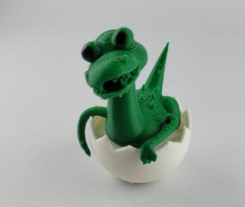 Junger Dino in der Eierschale