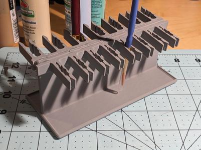 Two sided paint brush holder tray