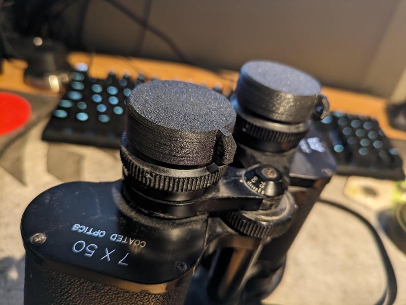 Regal binocular lens protectors.