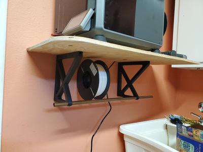 Printer shelf bracket with filament storage
