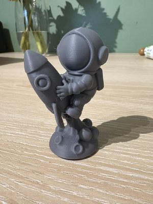 Spaceman Riding Rocket Model
