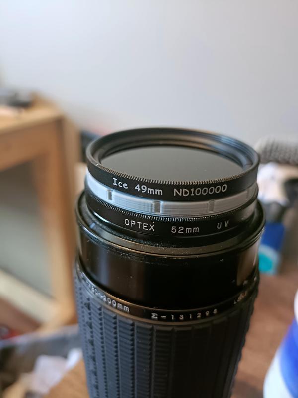 Lens filter adapter 49mm  to 52mm