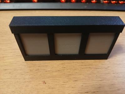 Olympus battery holder