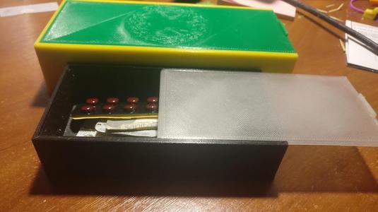 Box with sliding lid