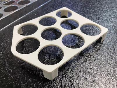 Egg holder for refrigerator side door