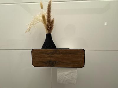 Toilet paper holder with interchangeable decorative plates
