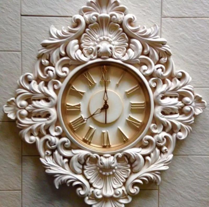 3 file of wood carved clock