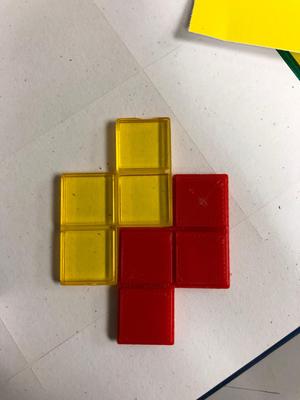 Blokus replacement piece (Yellow piece is the original)