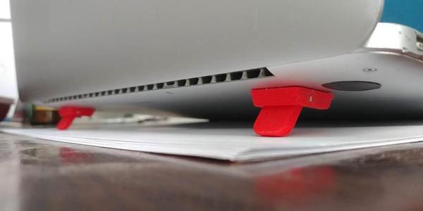 Foldable feet for laptop