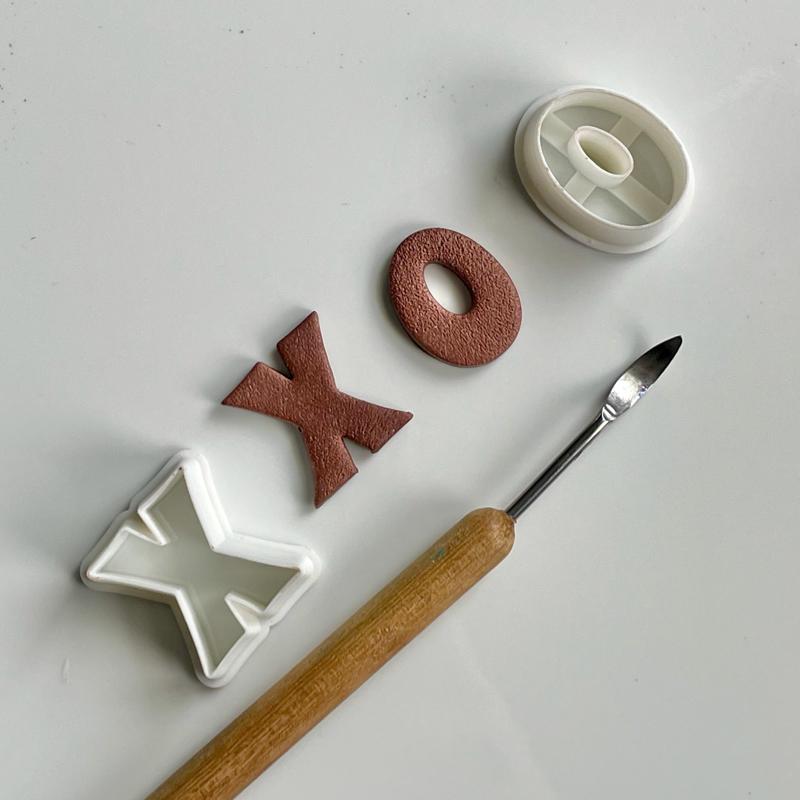 XO letter cutter pair