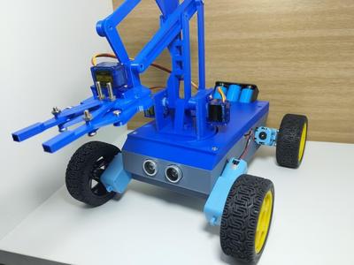 CAR WITH ROBOTIC ARM INCLUDES (CODE AND ELECTRONIC CIRCUIT)