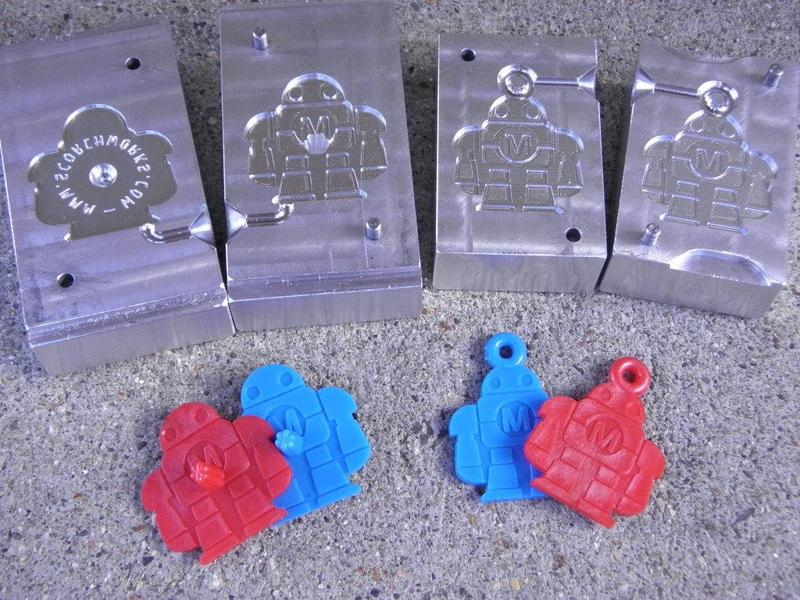 Maker Faire Robot Swag (Spinning Top and Fob)