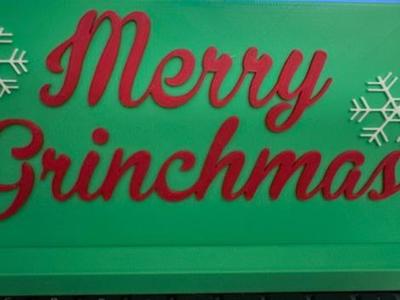 Merry Grinchmas sign with stand
