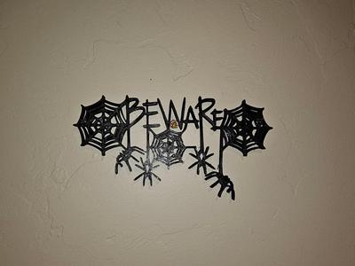 Beware Sign with Spiders
